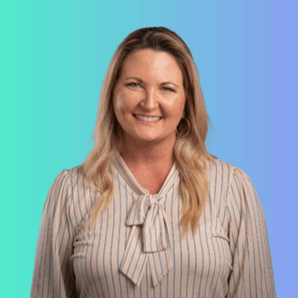 Coral Robison, PT, DPT Professional headshot of smiling woman with long blonde hair wearing striped blouse with bow tie against blue gradient background