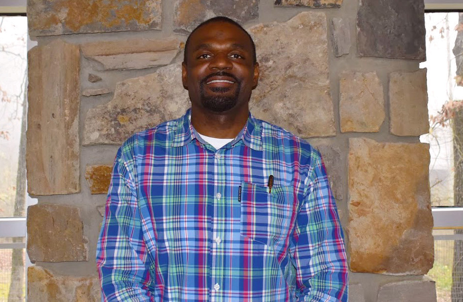 Joe poses for the camera at a retreat for the TBI State Partnership Program.