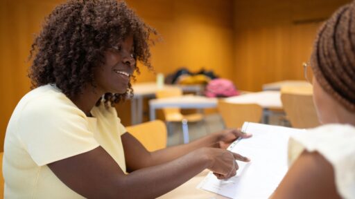Young teacher working with a student