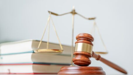 Law symbols on plain background