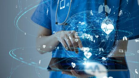 Medical professional working on tablet